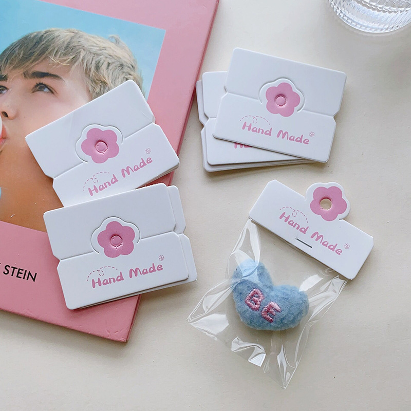 Cartes pliables suspendues de  - Body Jewelry Display avis et prix